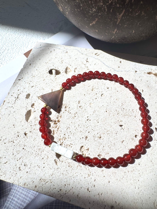 Carnelian Lucky Bracelet – Triangle Shell Center on Elastic Cord