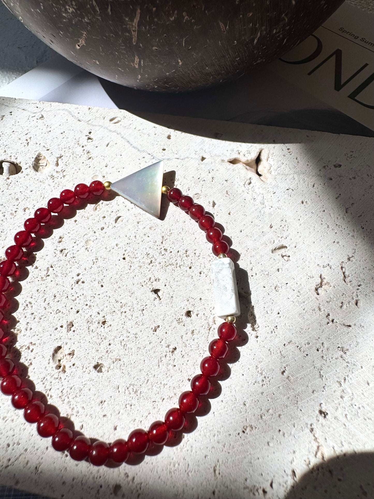 Carnelian Lucky Bracelet – Triangle Shell Center on Elastic Cord