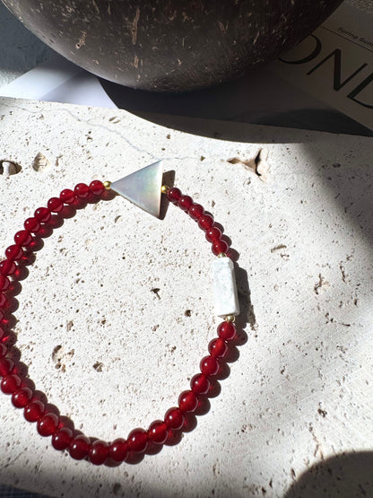 Carnelian Lucky Bracelet – Triangle Shell Center on Elastic Cord